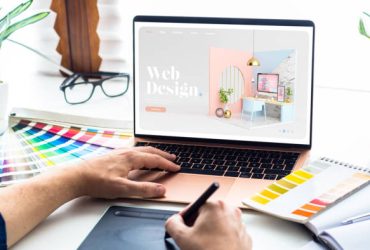 Web design desktop with  laptop and tools